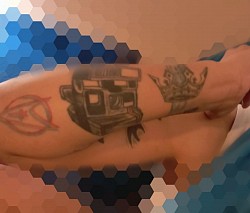 Right back of forearm star trek polaroid camera and king crown